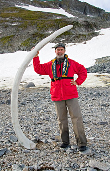 man and whale bones